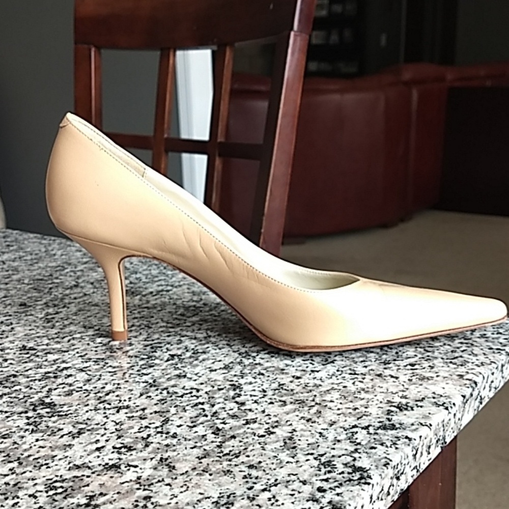 NEW COACH Heels